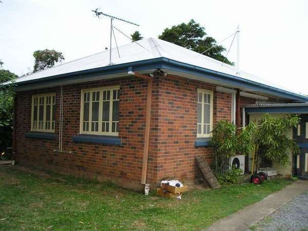 LOW SET RED BRICK HOME WITH POOL
